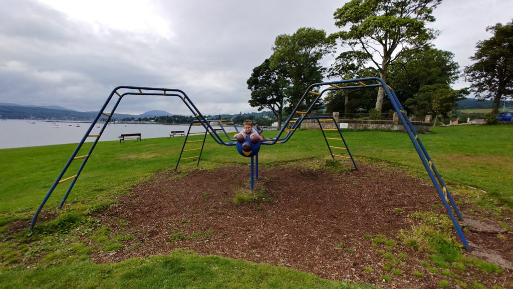 A young child plays upon the Kidston Park Spider
