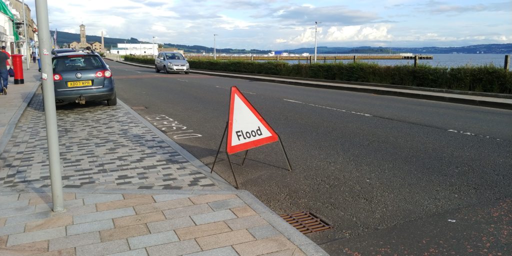 A flood warning sign on West Clyde Street