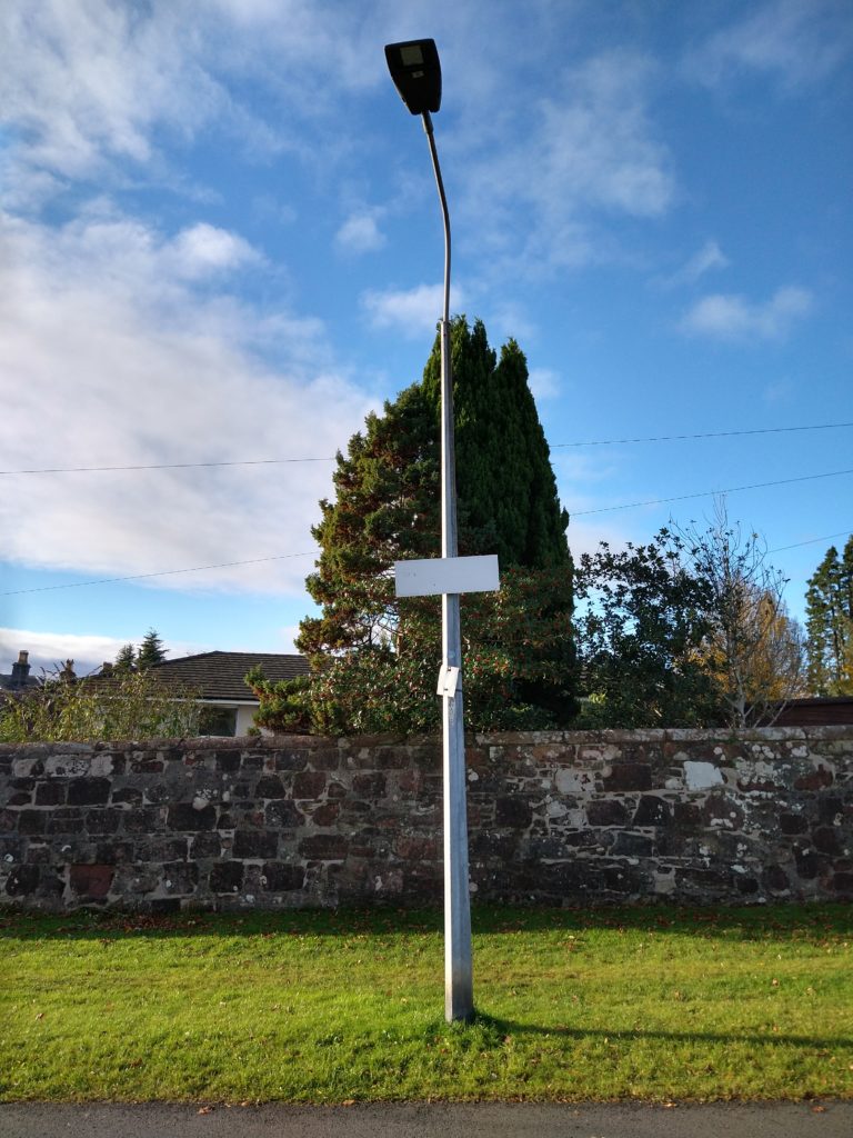 A faded street sign on a lamppost on upper Colquhoun Street, Helensburgh