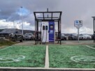 An out of order EV rapid charger at the front of two EV parking bays in Helensburgh's Leisure Centre car park