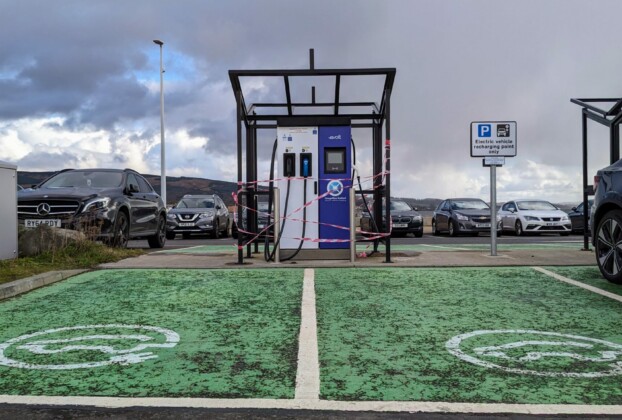 An out of order EV rapid charger at the front of two EV parking bays in Helensburgh's Leisure Centre car park